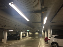 An underground parking with lots of fluorescent lights (click to enlarge).