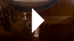 Watch a movie showing the pendulum swinging over the electromagnet (click to download)