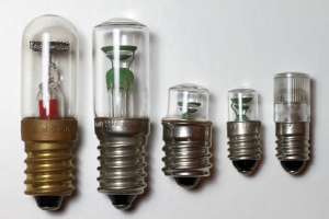 Five glow lamps with screw mount intended for mains indicator light applications: the three on the left have an E14 socket and the two on the right E10. (click to enlarge)