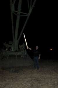 A fluorescent tube in a strong RF field also glows. Here, at the base of an insulated tower used as 137kHz transmitting antenna. (click to enlarge)