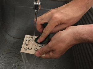 Removing the toner after etching: again just some scrubbing with an abrasive pad and some soapy water. (click to enlarge)