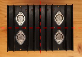 Correct mounting positions of four power transistors on the same heat sink. The red dashed lines represent the virtual division in four equal smaller heat sinks.